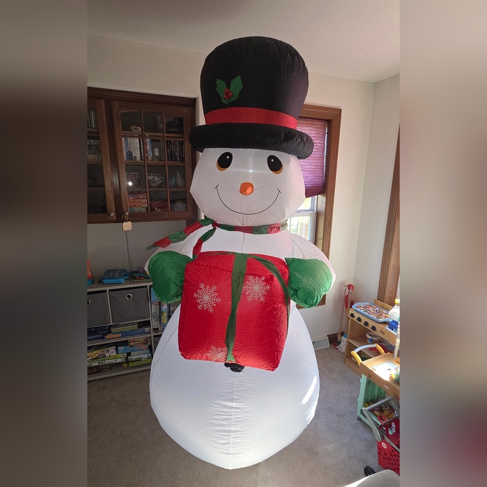 8ft Tall Inflatable - Yard Blow Up Decor Lights Up Snowman with scarf and gift.